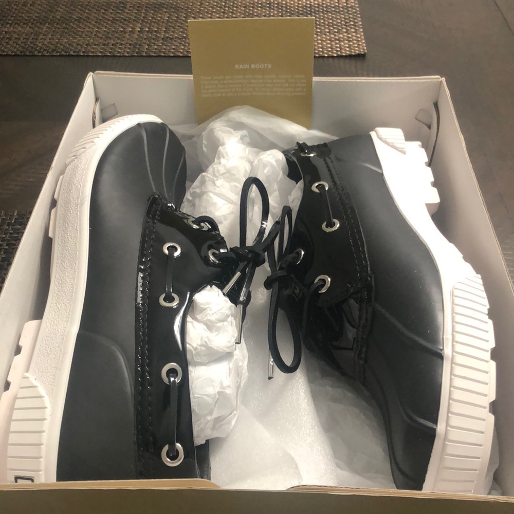 MK rain boots. Brand new, never worn with box.